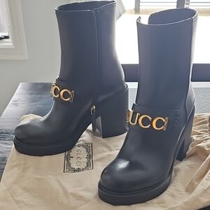 Gucci Black Heeled Boots with Gold Accents
